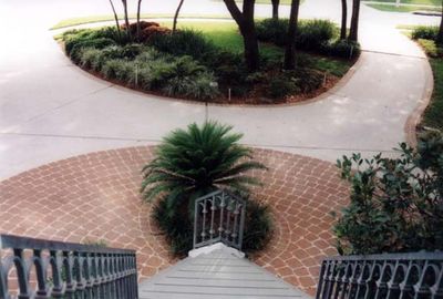 Image of circular tile at bottom of steps.